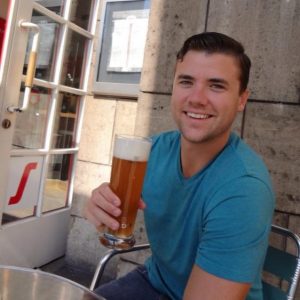 Grant drinking a German beer in Stuttgart