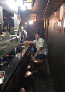 Grant eating lunch in Omoide Yokocho "Piss alley"