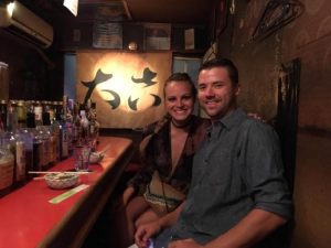 Grant and Rachel at a bar in Golden Gai Tokyo