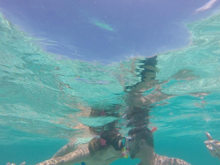 Grant and Rachel kissing in Akumal