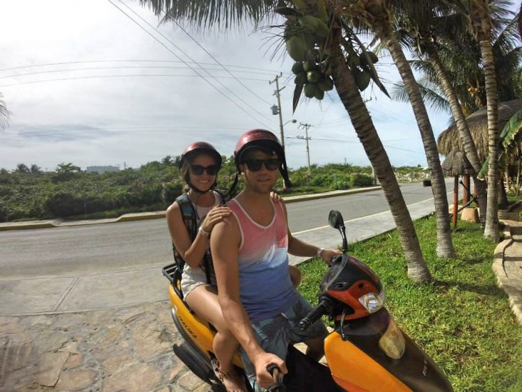 Grant and Rachel on moped on Isla Mujeres