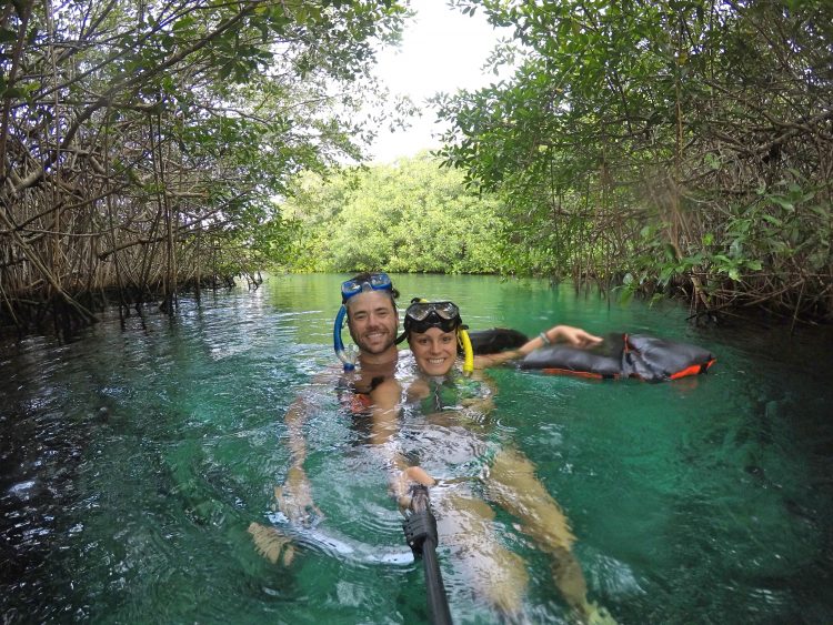 Grant and Rachel snorkeling in one of the best cenotes in Tulum