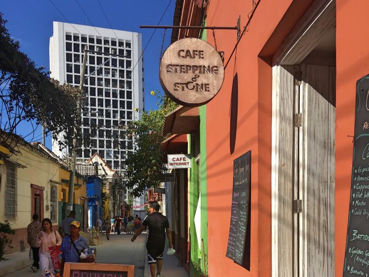 sign outside of cafe stepping stone in cartagena