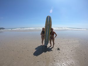 sisters surfing in costa rica